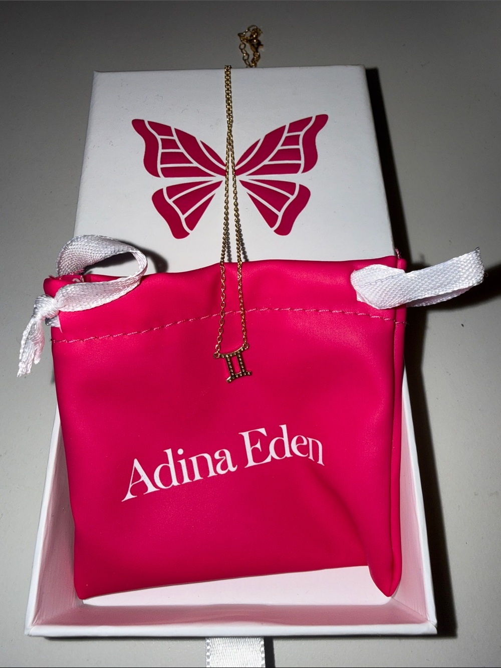 Adina Eden Pink Women's Gemini Zodiac necklace.